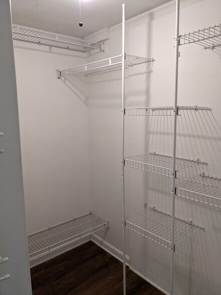 Rear of L-shaped walk-in closet. - 1649 Summerhill Dr