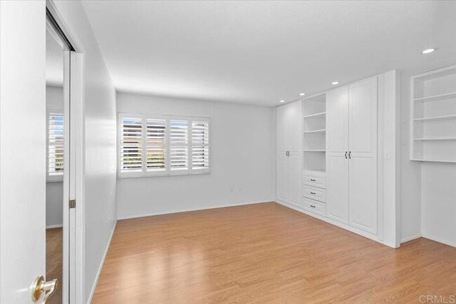 Building Photo - Poolside Living at Its Finest – Turnkey 3BR Condo with Direct Patio Access to the Pool