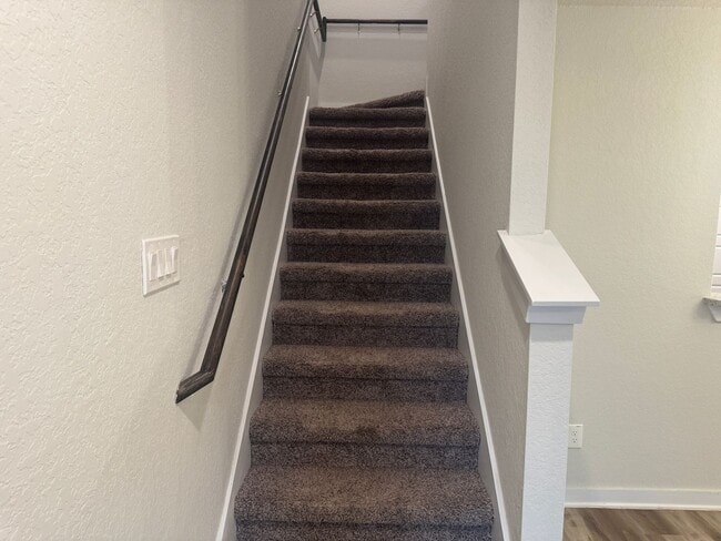 Building Photo - Stylish, Spacious & Close to It All – Your Ideal Townhome Awaits!