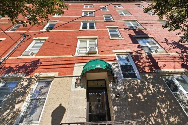 Building Photo - 314 Paterson Plank Rd