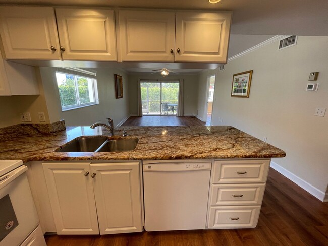 Building Photo - ANNUAL RENTAL - 3 BED / 2 BATH WITH CARPOR...