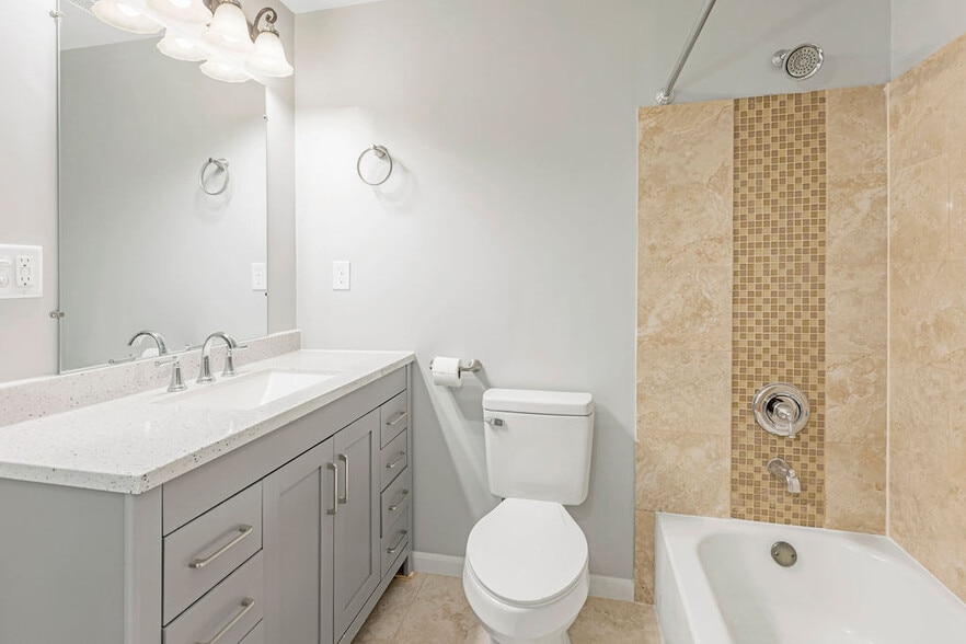Bathroom with 48 inch vanity and linen closet - 5125 Carthage Ave