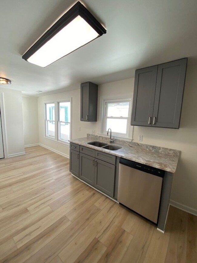 Building Photo - Welcome to this newly remodeled 4-bedroom,...