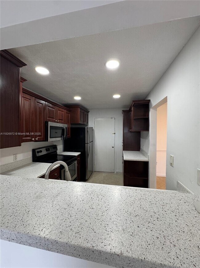 Building Photo - 4848 NW 24th Ct