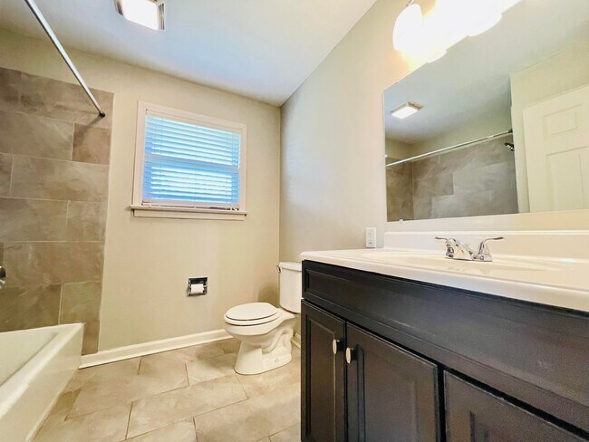 Building Photo - 223 Raintree Ln