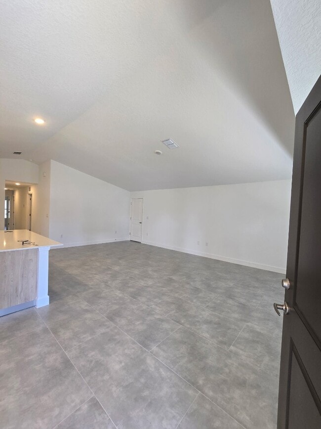 Building Photo - Brand-New 4-Bed Beauty with Attached Garage in Palm Bay – Modern Comfort, Prime Convenience!