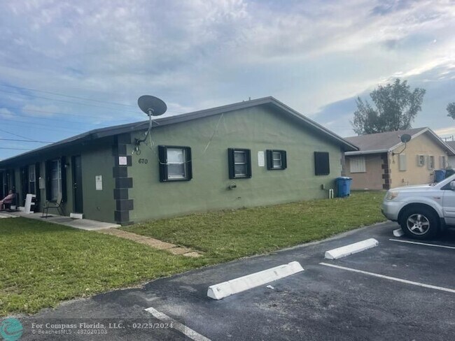 Building Photo - 670 NE 46th Ct