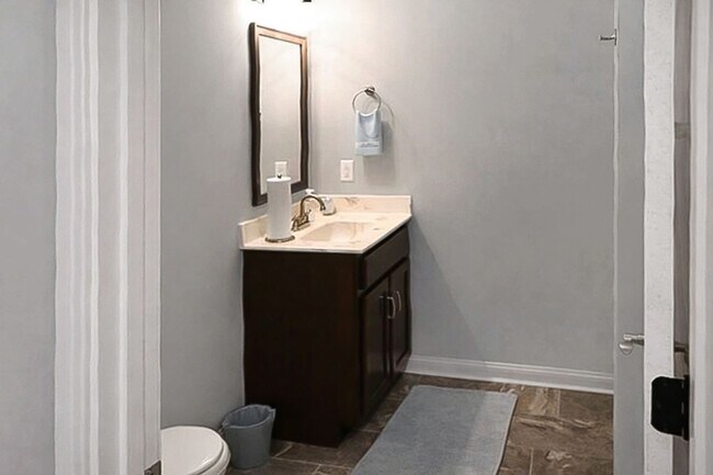 Building Photo - Pet Friendly Three Bedroom with Bonus!