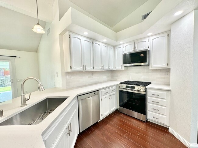 Building Photo - Wonderful Single-Story Home on Spacious Corner Lot with Privately Fenced Yard Space & Attached-Tw...