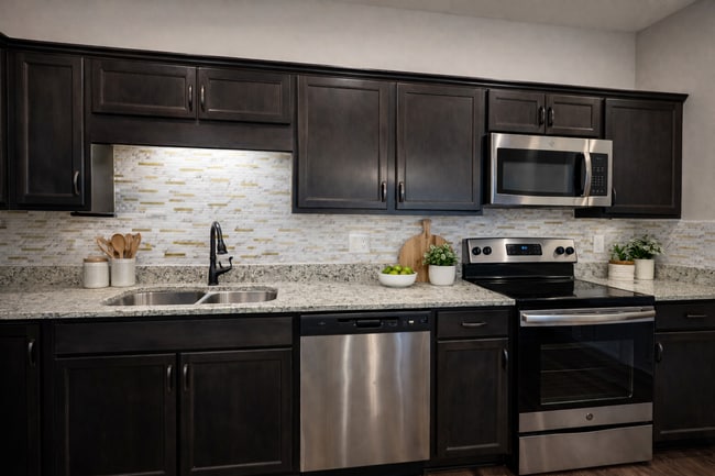 Building Photo - $250 OFF Move In Special! - Modern 3 Bedroom Townhome in Prime Location