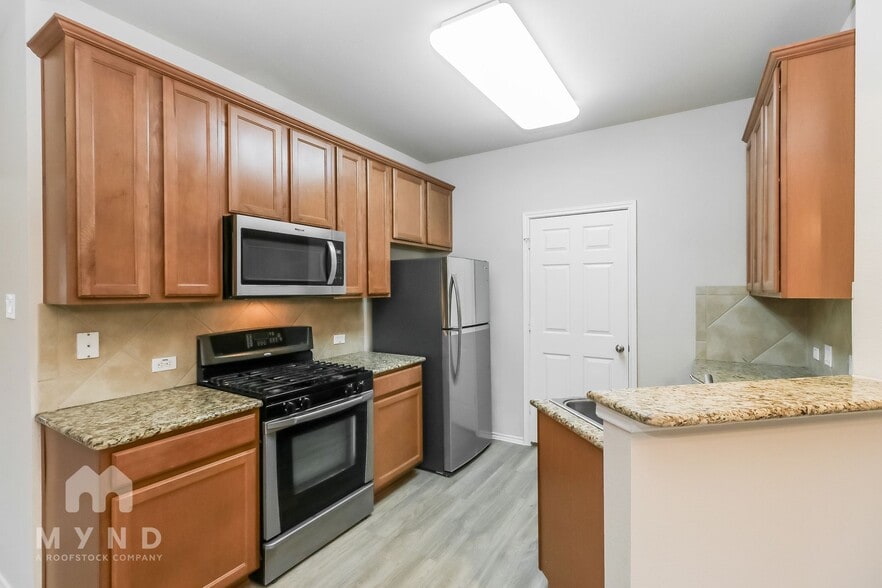 Building Photo - 1310 W Parmer Ln