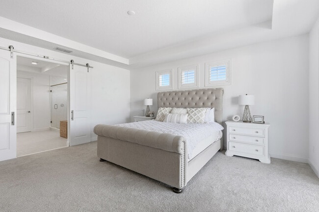 Building Photo - Luxury 5-Bedroom Residence in Eagle Creek with Indoor-Outdoor Living