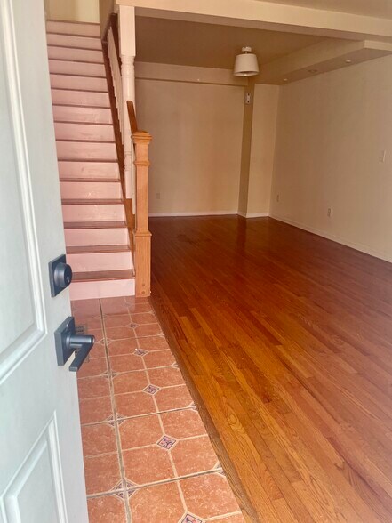 Front door open Look into the Living room and stairs - 604 Gerritt St