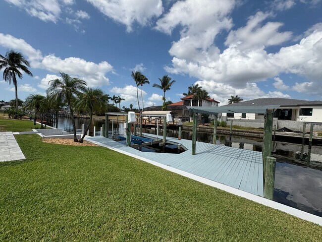Building Photo - Beautifully Furnished Pool Home with Boat ...
