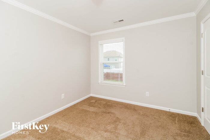 Building Photo - 6608 Championship Dr