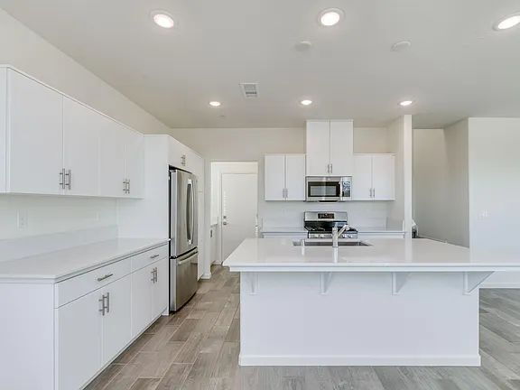 Building Photo - NEW! Modern, Wilson Home. 3 bedrooms / 2.5-bathroom single-family home in a quiet gated community...