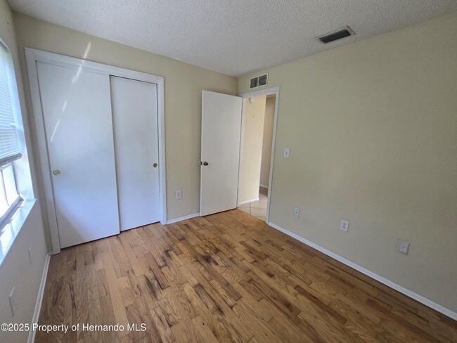 Building Photo - 8915 Woodmill Dr