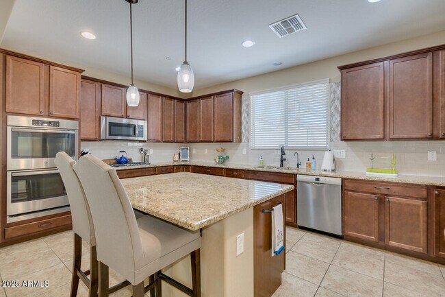 Building Photo - 21450 W Almeria Rd
