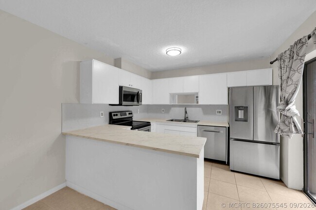 Building Photo - 5857 SE Windsong Ln