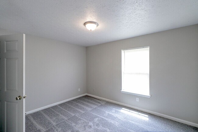 Building Photo - 8508 Standing Oak Dr