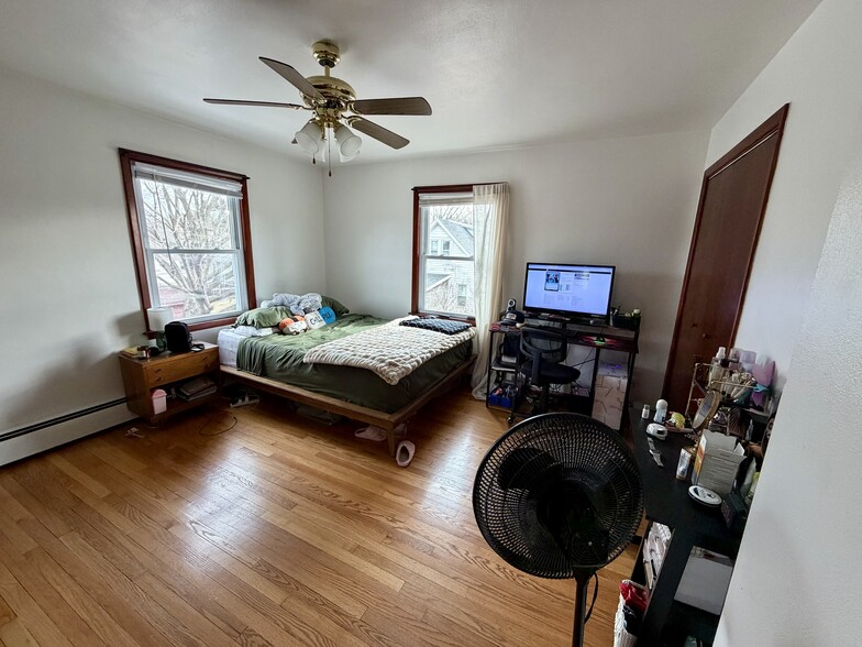 Primary bedroom, windows facing south and east - 2113 N Sherman Ave