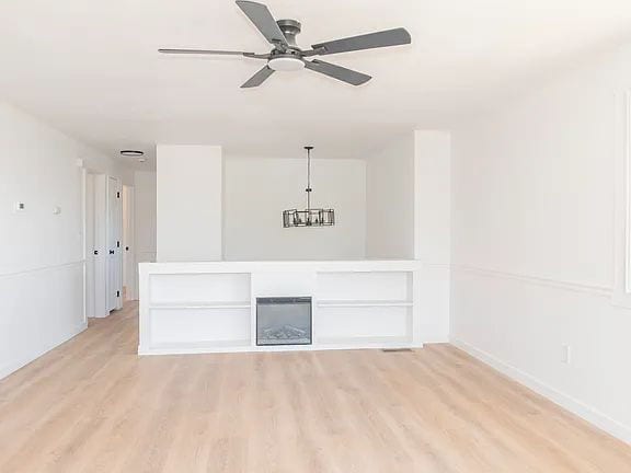 Building Photo - "Charming 5-Bed Sanctuary with Cozy Fireplace on South Rogers Street!"