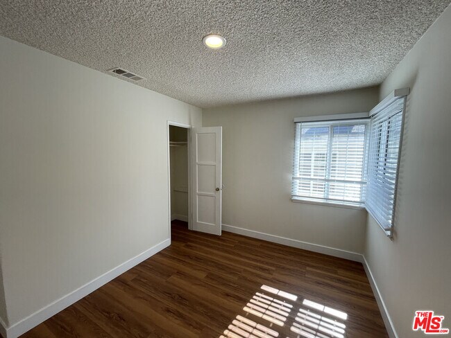 Building Photo - 10631 Tinker Ave