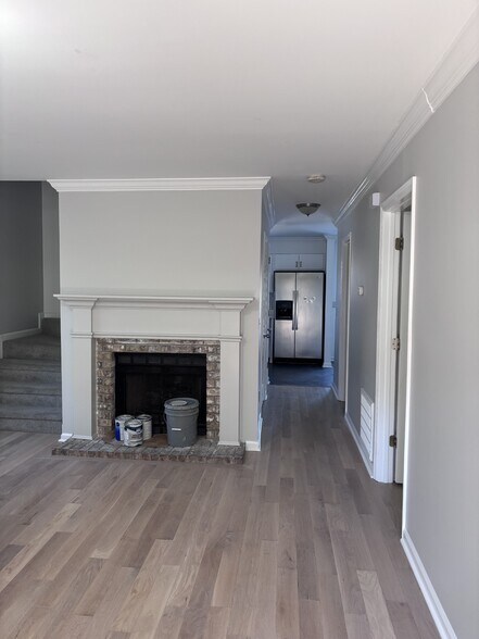 Freshly painted living area with new floors - 314 Deerpoint Dr