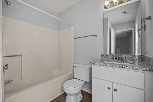 Building Photo - Spacious 3 Bedroom Home, LVP Floors, Updated Kitchen, New Cabinets, Granite, SS Appliances, Pet F...