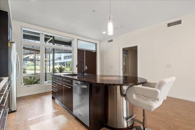 Building Photo - Resort Style Amenities in a Luxury, Modern 2 Bedroom Condo