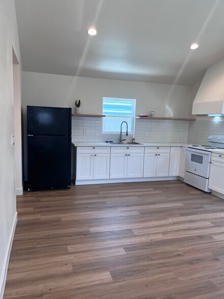 Living Area & Kitchen - 8144 Washington Ave