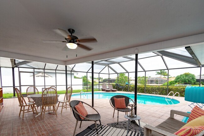 Building Photo - Gulf Access Pool Home. 4BED/2BATH. SE OF CAPE CORAL FL. Special Offer! Qualify for a deposit-free...