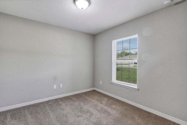 Building Photo - Freshly Painted 3BR Home with Spacious Yard, Modern Baths & No Deposit Option!