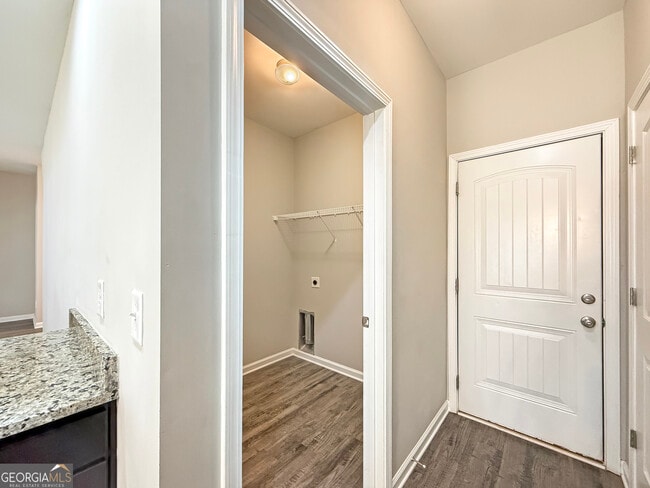 Building Photo - 6369 Woodland Station Dr