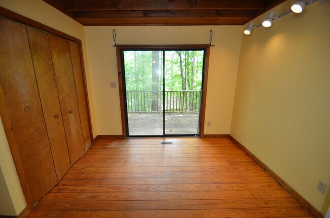 Building Photo - Private Wooded Retreat Near UNC with Vaulted Ceilings & Cozy Woodstove