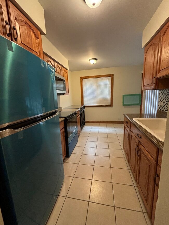 Building Photo - 1432 W Rosemont Ave