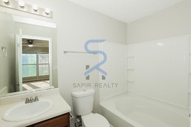 Building Photo - Move in before February 15th and choose your reward: a $250 Amazon Gift Card or a 55" Smart TV!