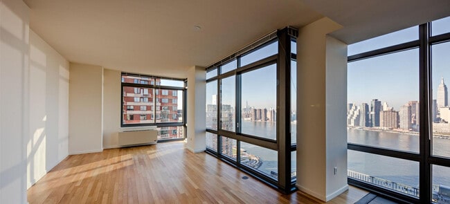 Building Photo - 4-75-75 48th Ave