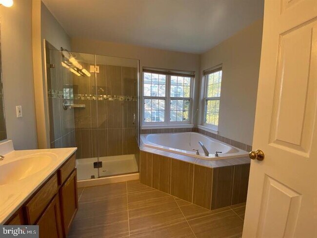 Building Photo - Impressive Three-Bedroom Townhome in North...