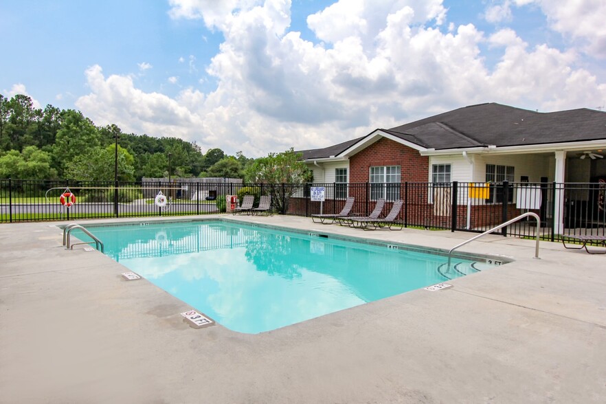 Take a dip in the swimming pool - Hallmark at Timberlake Apartments