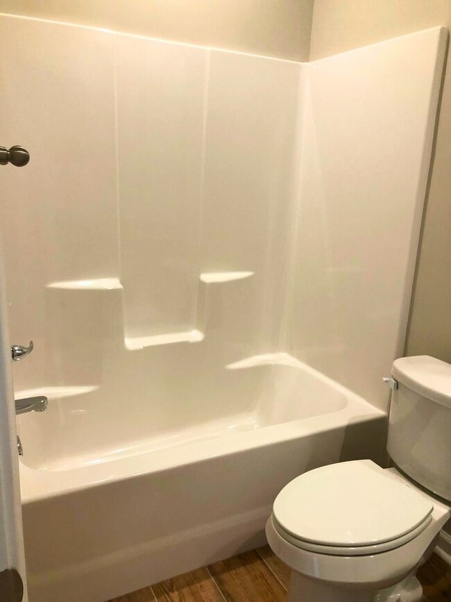 Building Photo - 3/2 with landscaping included!