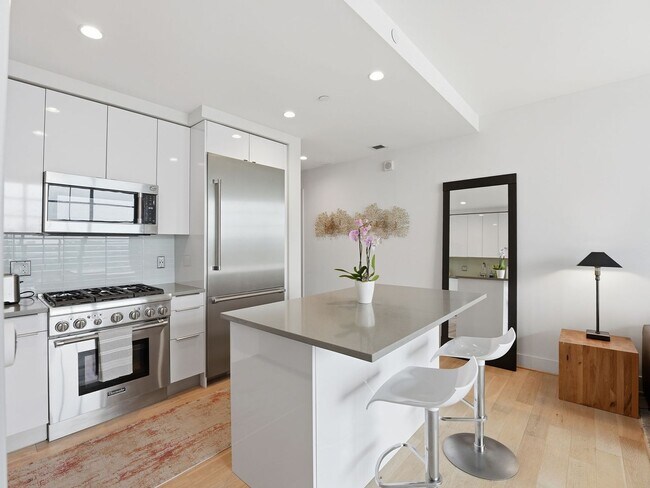 Building Photo - Designer-Furnished Waterfront Living at VIO Condominiums!