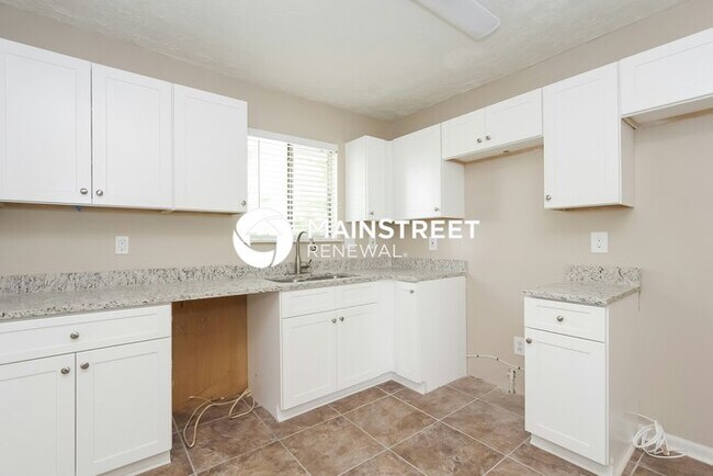 Building Photo - 5 Bedroom Pet-Friendly Home in Fairburn, GA with Main Street Renewal