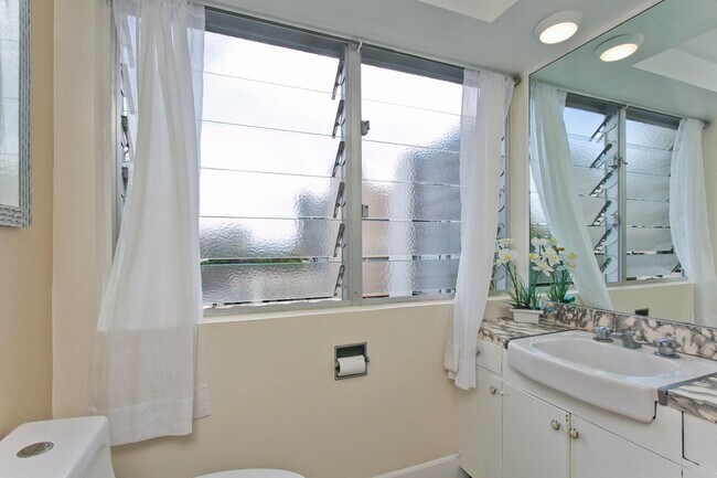 Building Photo - Welcome to The Bel-Aire, an exclusive and rarely available gem nestled in the heart of Waikiki!