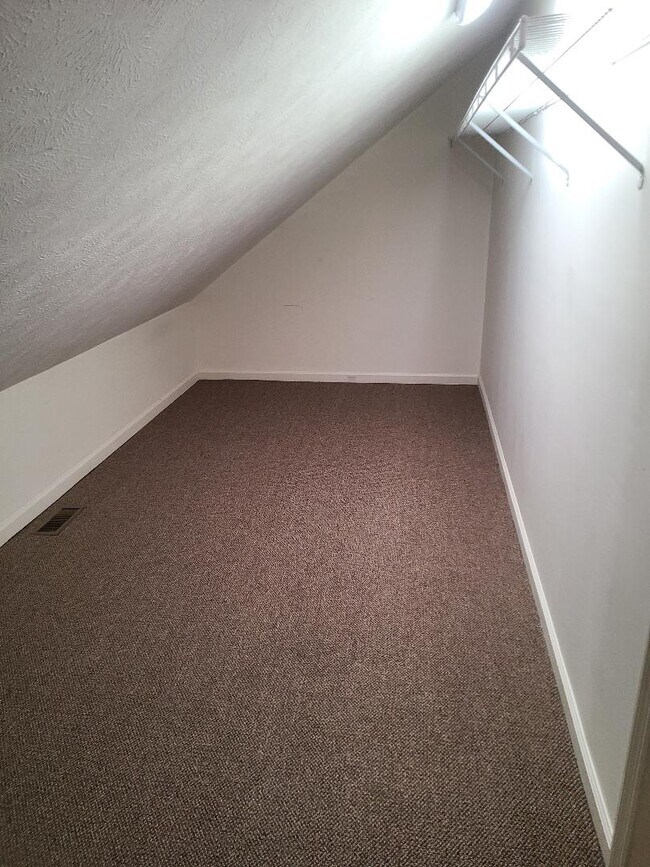Walk-in closet and storage - 1526 Old Oak Ln