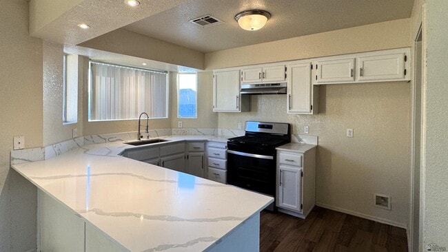 Building Photo - 8573 E 25th St