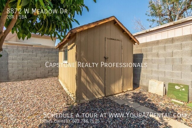 Building Photo - 8872 W Meadow Dr