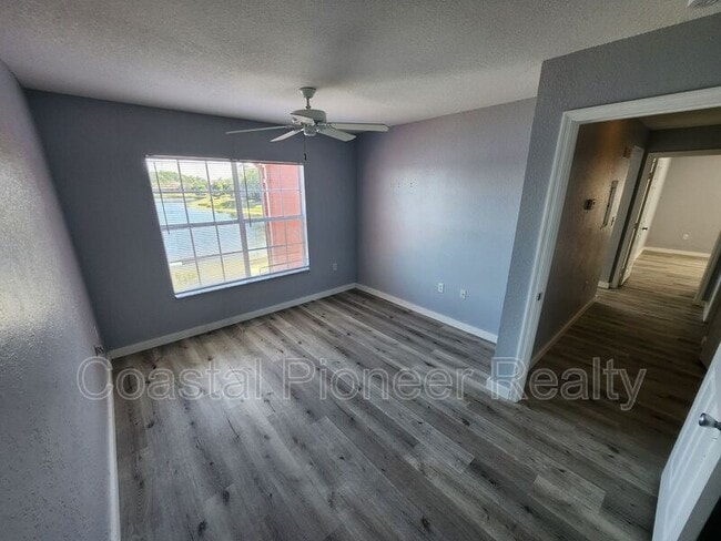 Building Photo - 9232 Lake Chase Island Way