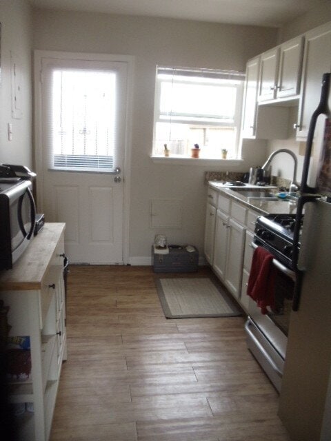 Building Photo - 1 Bed 1 Bath Mayfair Apartment With Garage in Denver! Available Now!