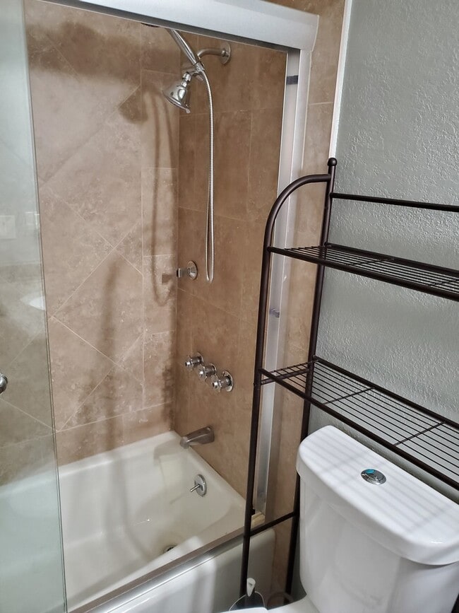Building Photo - ENCHANTING 1 Bd/1 Ba Ground Floor Unit w/O...